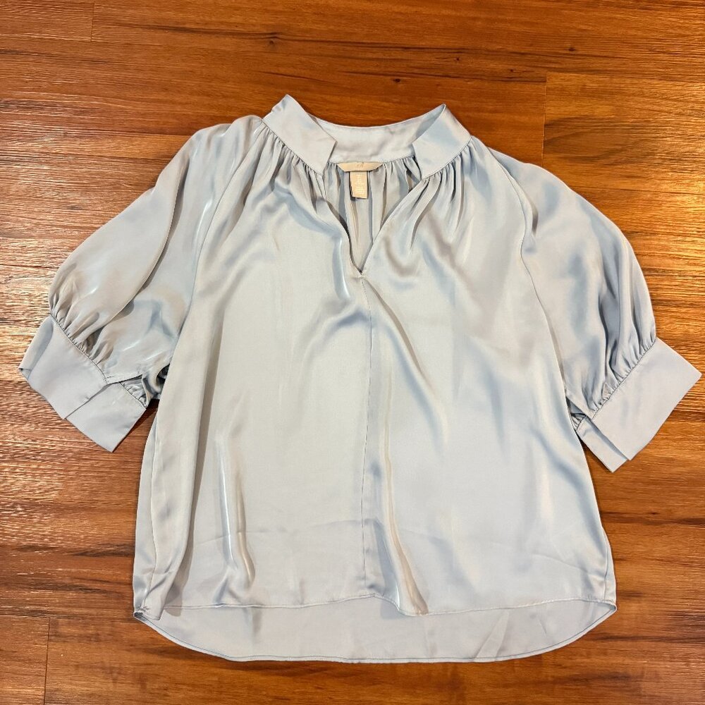 H&M light blue satin blouse. Women's size large. Worn once.